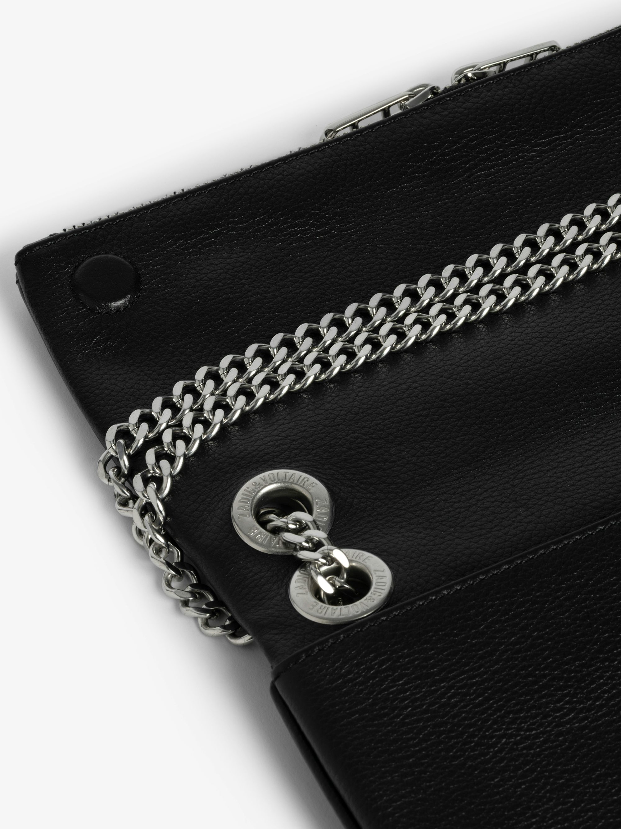 Rock II Clutch - Clutch in grained leather with sliding metal chain and signature wings.